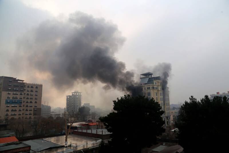 Smoke rises from a hotel in Afghanistan's capital Kabul after it was attacked by gunmen on Monday. EPA
