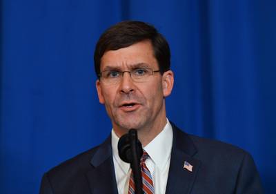 (FILES) In this file photo taken on December 29, 2019 US Secretary of Defense Mark Esper speaks onstage during a briefing on the past 72 hours events in Mar a Lago, Palm Beach, Florida on December 29, 2019. US Defense Secretary Mark Esper denied on January 6, 2020 that US forces would pull out of Iraq, after a US general's letter told the Iraqi government that troops were preparing to depart "in due deference to the sovereignty" of the country.
 / AFP / Nicholas Kamm

