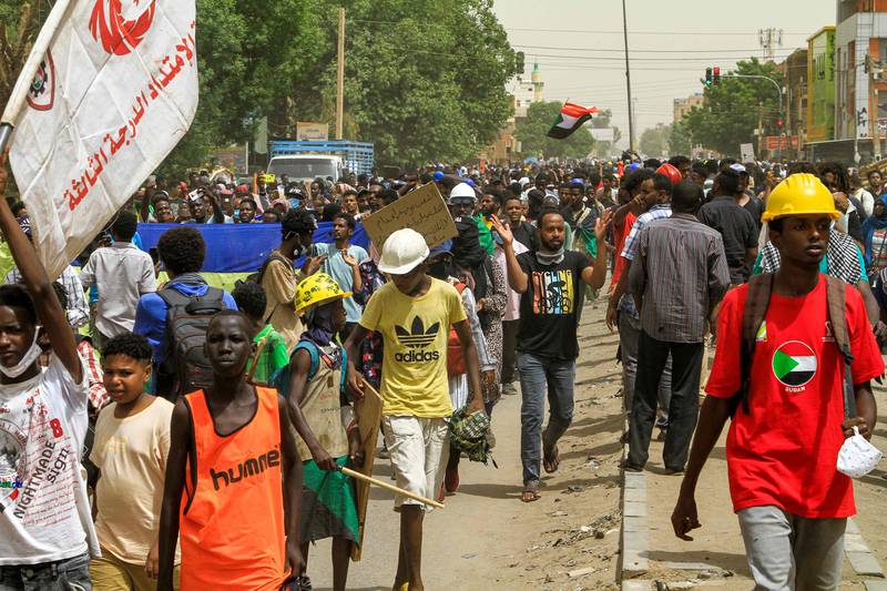 People march against military rule in the Bashdar area of Sudan's capital Khartoum. AFP