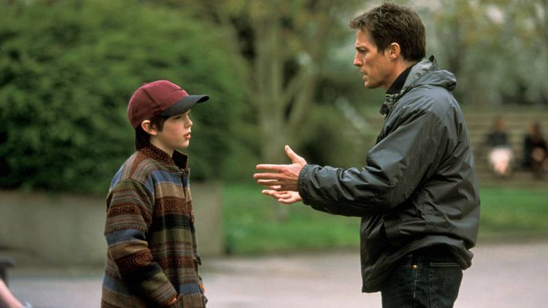 Nicholas Hault as Marcus and Hugh Grant as Will Freeman in About a Boy. Photo: Universal Pictures