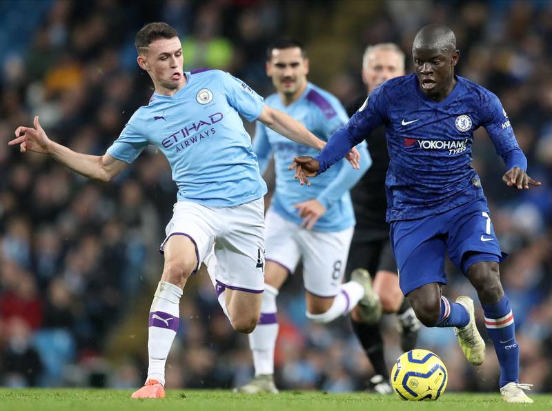 Chelsea's N'Golo Kante (R) in action against Manchester City's Phil Foden. EPA