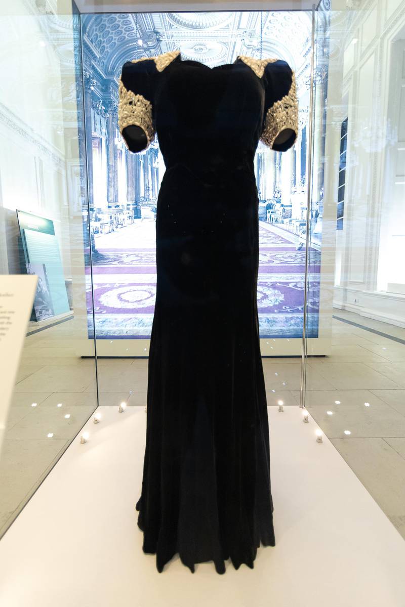 An evening dress worn by Queen Elizabeth, The Queen Mother, is displayed in the Royal Style in the Making exhibition at Kensington Palace in London. Getty Images