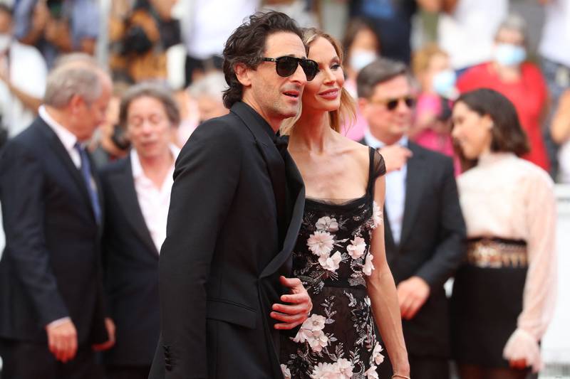 Adrien Brody and Georgina Chapman attend the screening of 'The French Dispatch' at the 74th annual Cannes Film Festival on July 12, 2021