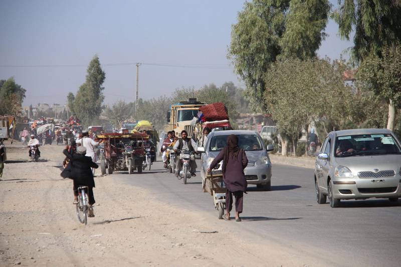 Afghans flee their villages after fighting intensified between Taliban militants and security forces, in Lashkargah, the provincial capital of restive Helmand province, Afghanistan.  EPA