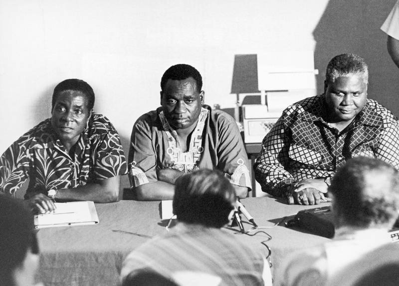 TANZANIA - JANUARY 01:  From The Left: One Of The Leaders Of The Rhodesian Fighting Forces Robert Mugabe, The Secretary For Information And Deputy Of The African National Congress (Anc) Georges Silundika And The Leader Of The Zapu Party (Zimbabwe African People Union) Joshua Nkomo At A Meeting In Dar Es Salaam, Tanzania In The 60'S.  (Photo by Keystone-France/Gamma-Keystone via Getty Images)