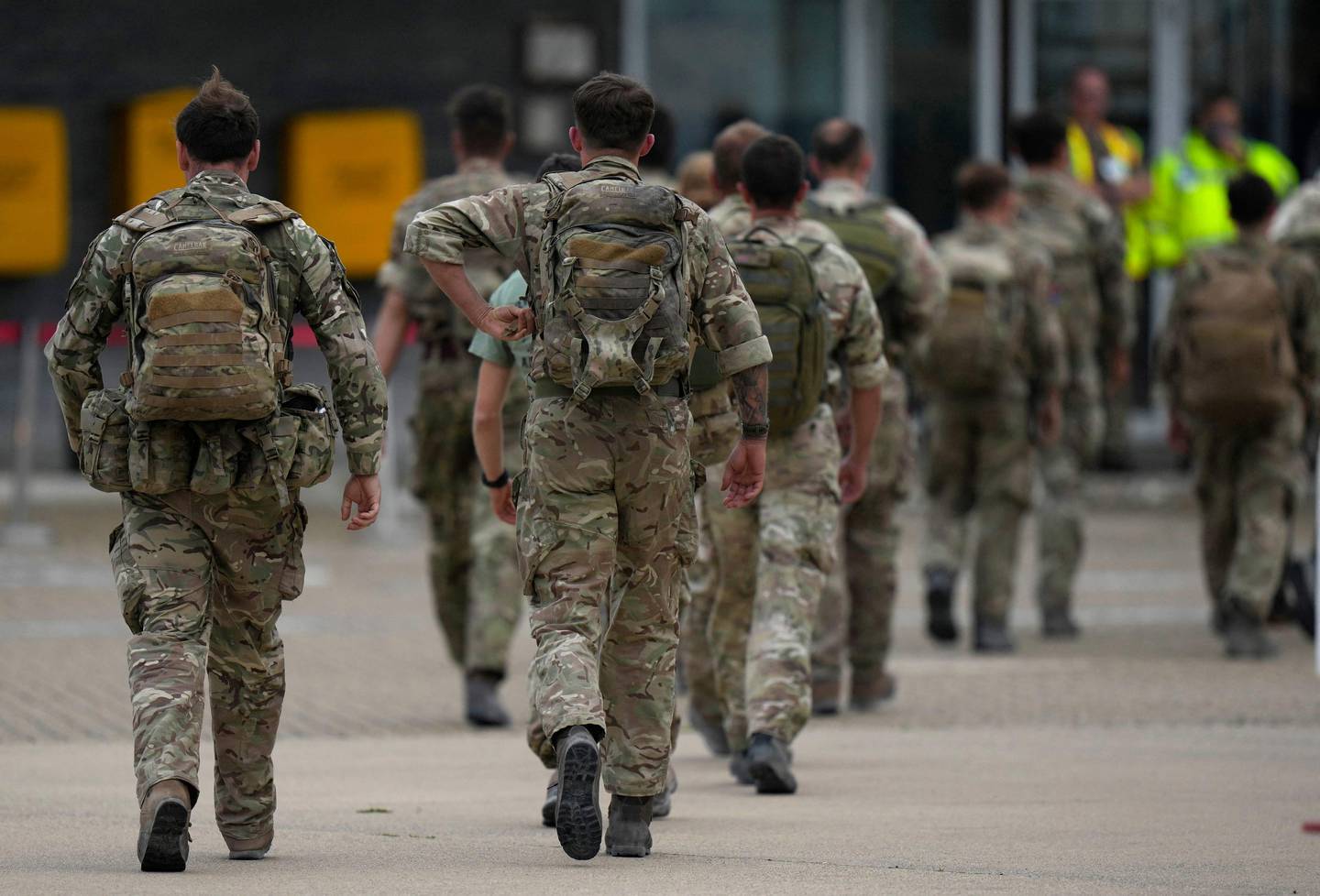 Members of the UK's 16 Air Assault Brigade disembark a flight at the UK's RAF Brize Norton. AFP 