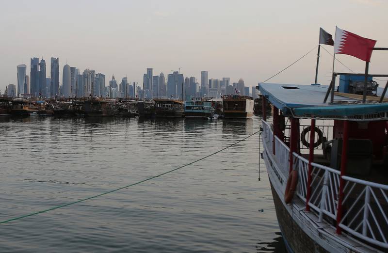 In this May 3, 2018 photo, commercial dhows anchor at the bay of Doha, Qatar. A year into a blockade by four Arab states against Qatar, the small country has weathered the storm by drawing from its substantial financial coffers, using its strategic location in the Persian Gulf as the worldâ€™s largest producer of liquefied natural gas to continue shipments to major world powers, and forging tight alliances with countries like Turkey and Iran. (AP Photo/Kamran Jebreili)