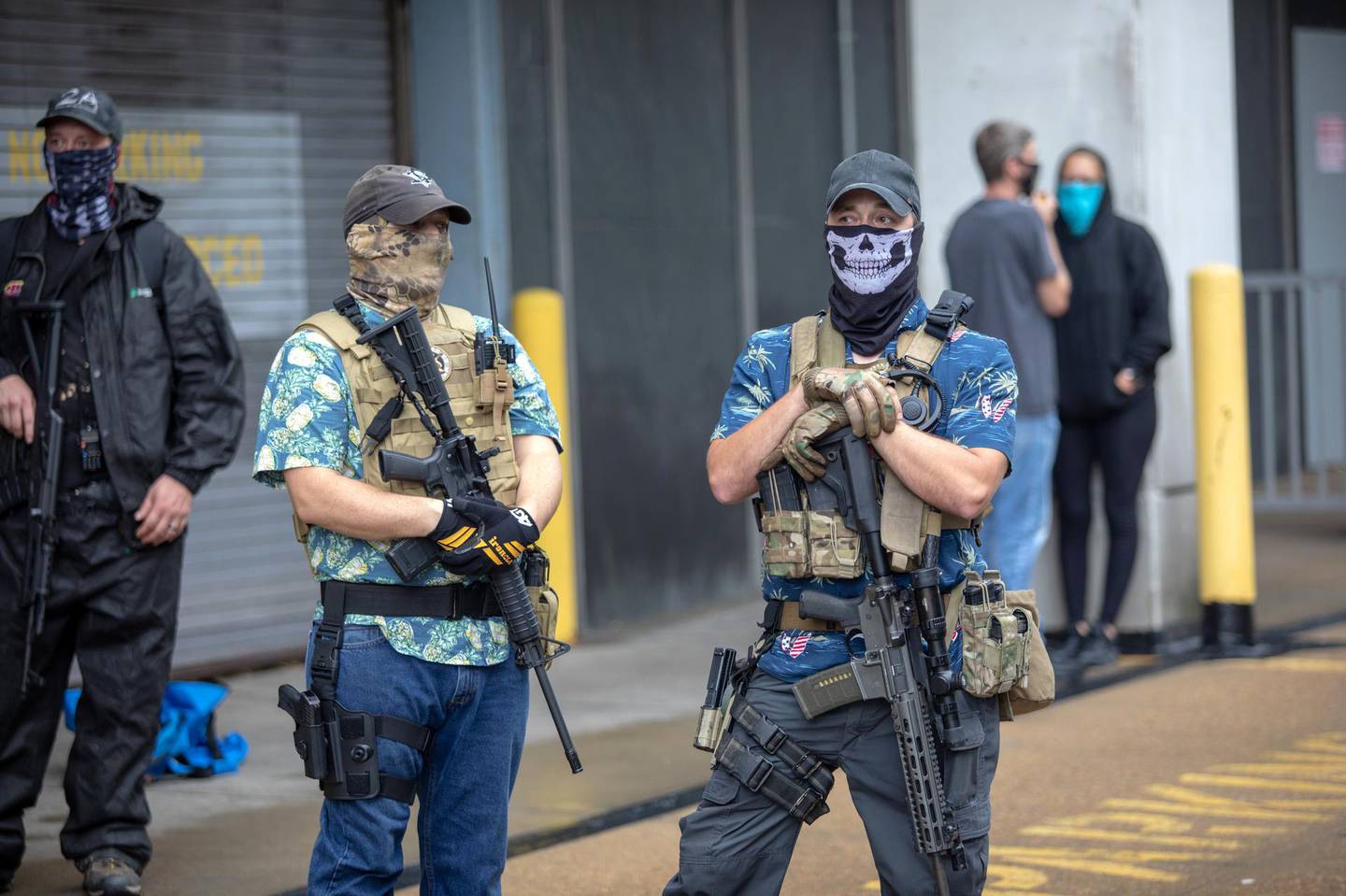 RICHMOND, VIRGINIA, UNITED STATES - 2020/08/15: Armed Boogaloo Boys wearing their signature Hawaiian shirts at an open carry rally, a gun rights rally held by a group of activists known as BLM757.
Multiple groups have demonstrated against the new firearm restrictions that were effected on July 1st, 2020. (Photo by Chad Martin/SOPA Images/LightRocket via Getty Images)