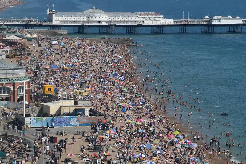 A packed Brighton beach during a heatwave in 2020.