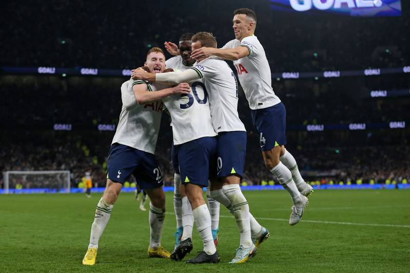 Tottenham Hotspur's Uruguayan midfielder Rodrigo Bentancur celebrates with teammates after scoring the winner. AFP