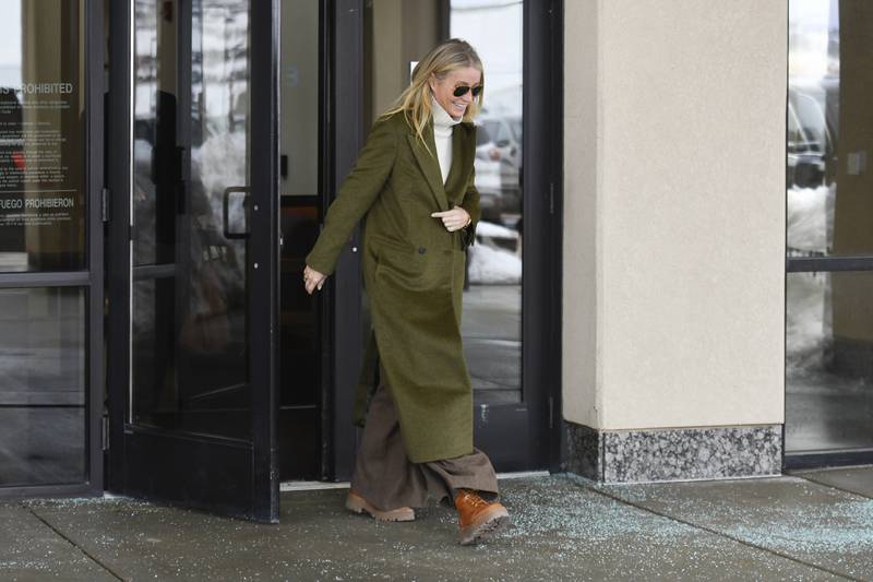 Gwyneth Paltrow wore an olive coat and oatmeal turtleneck jumper from The Row, with oversized trousers, Celine boots and Ray-Ban Aviators to attend court on the first day of the lawsuit in Park City, Utah on March 21. AP Photo