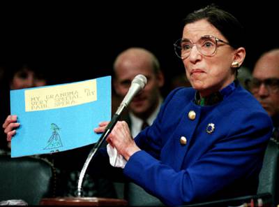 Ruth Bader Ginsburgh holds up a drawing of herself with the words "My Grandmother Is Very Special by Paul Spera" as she appears before the Senate Judicary Committee July 20, 1993, the first day of her confirmation hearings for the post of Supreme Court Justice. Paul is Ginsburg's grandson. Reuters