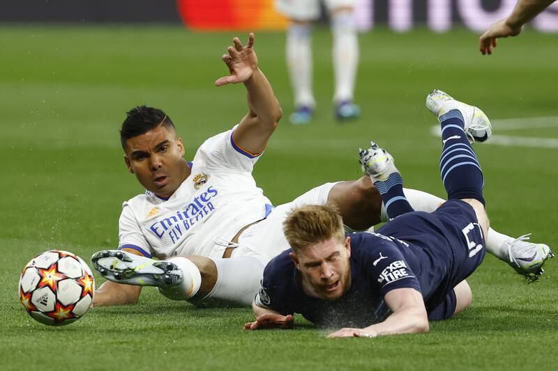 Casemiro - 8: Welcome return to side after injury and made plenty of trademark interceptions - but should have been booked in first half either for poor scissors tackle on De Bruyne or hauling down Foden by his shirt. EPA
