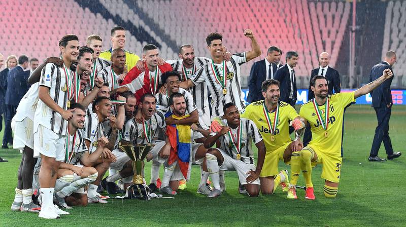 Juventus players celebrate after being crowned champions at the end of their 3-1 Serie A defeat against Roma at the Allianz Arena, Turin, on Saturday, August 1. EPA