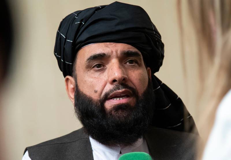 FILE - In this May 28, 2019, file photo, Suhail Shaheen, spokesman for the Taliban's political office in Doha, speaks to the media in Moscow, Russia. Shaheen, spokesman for the Taliban's political office in Doha, told The Associated Press that the Taliban's negotiating team was set to open talks with U.S. peace envoy Zalmay Khalilzad. He has been in the region for several weeks meeting a legion of regional and Afghan officials, including Afghan President Ashraf Ghani. (AP Photo/Alexander Zemlianichenko, File)