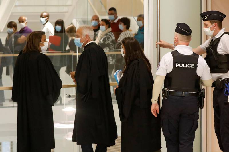 Lawyers arrive at the courtroom on the opening day of the trial of the January 2015 Paris attacks against Charlie Hebdo satirical weekly,. Reuters
