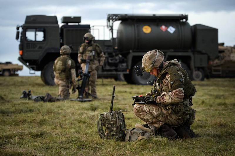 SALISBURY, ENGLAND - OCTOBER 14: A mortar platoon from the Royal Anglian Regiment bed in after establishing a Leaguer during their Mission Rehearsal Exercise ahead of deployment to Mali, on the Ministry of Defence training area on Salisbury Plain, on October 14, 2020 in Salisbury, England. Later this year, 300 military personnel will join the UN in Mali on a peacekeeping mission and help counter instability following a coup which ousted President KevØta in August. The United Nations Multidimensional Integrated Stabilization Mission in Mali (MINUSMA) was formed in response to the seizing of territory by militant Islamists following a coup in 2012. The crisis in Mali has thrust 12.9 million into a precarious security situation, according to a UN estimate, with 6.8 million in need of humanitarian assistance. (Photo by Leon Neal/Getty Images)