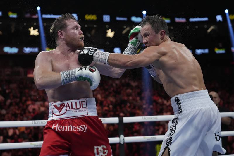 Canelo Alvarez and Gennady Golovkin exchange punches during their super middleweight title fight. AP