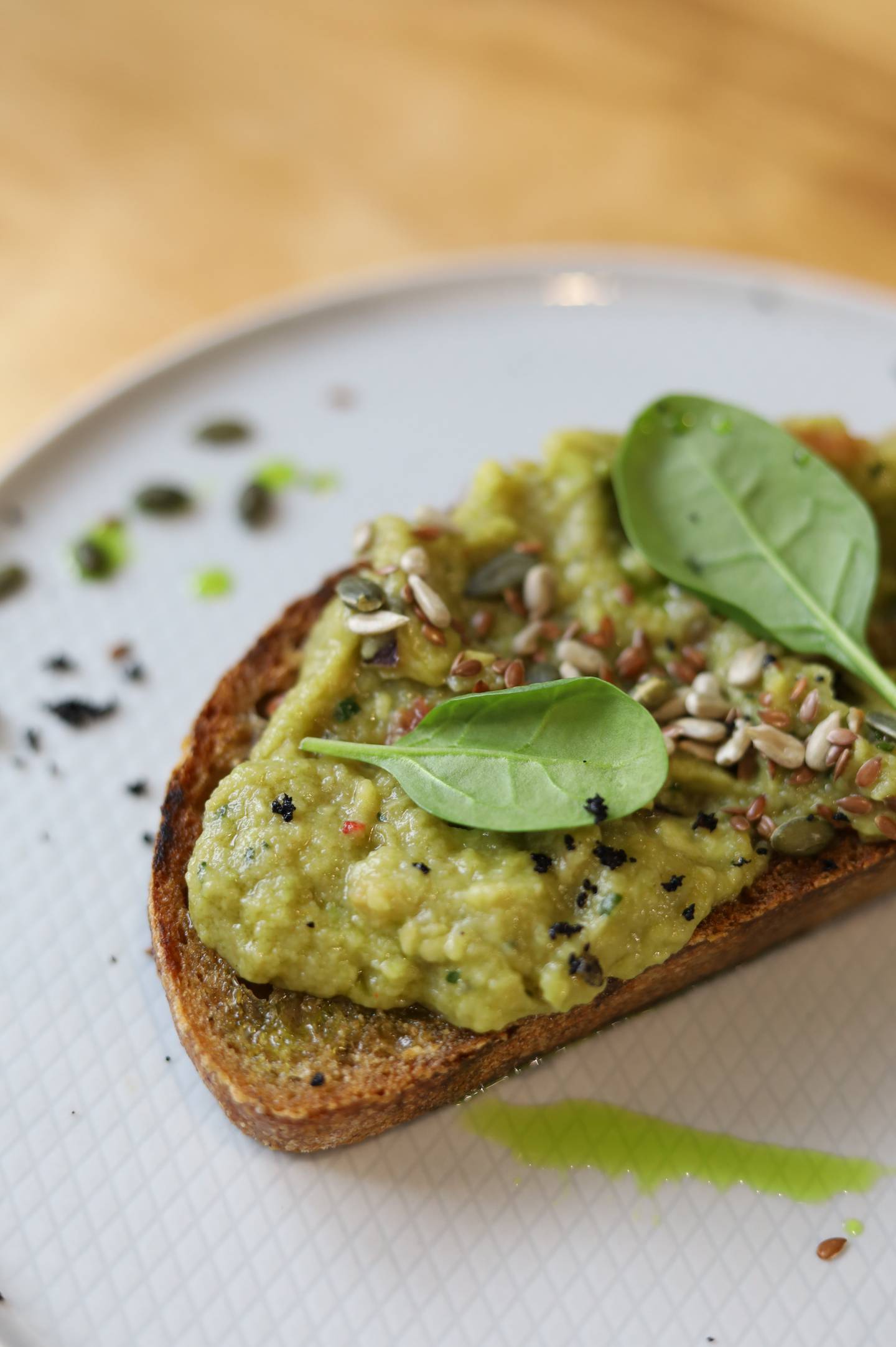 Toast's most recent incarnation cut from an artisanal loaf topped with smashed avocado. Victoria Nazaruk / Unsplash