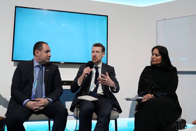 From left, Irakli Beridze, head of the UN’s Centre for Artificial Intelligence and Robotics, Iain Drennan, executive director of WeProtect Global Alliance and Dana Humaid Al Marzooqi, general director of the International Affairs Bureau, at the summit. Pawan Singh / The National