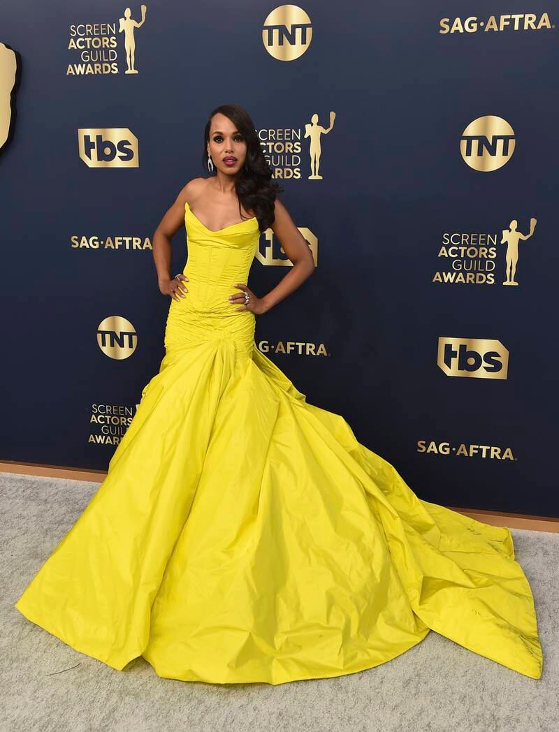 Kerry Washington arrives in a strapless yellow gown. AP