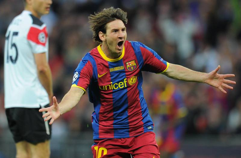 Barcelona's Argentinian forward Lionel Messi celebrates after scoring a goal during the UEFA Champions League final football match FC Barcelona vs. Manchester United, on May 28, 2011 at Wembley stadium in London.Barcelona won 3 to 1. AFP PHOTO / LLUIS GENE (Photo by LLUIS GENE / AFP)