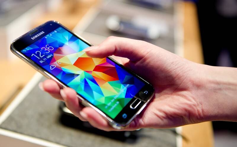 The new Samsung Galaxy S5 smartphone in 2014 was the first to feature  a heart-rate monitor. EPA