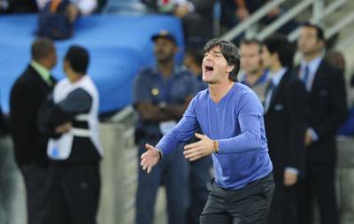 Germany's coach Joachim Loew reacts during the 2010 World Cup semi-final football match Germany vs. Spain on July 7, 2010 at Moses Mabhida stadium in Durban. NO PUSH TO MOBILE / MOBILE USE SOLELY WITHIN EDITORIAL ARTICLE -     AFP PHOTO / JOHN MACDOUGALL (Photo by JOHN MACDOUGALL / AFP)