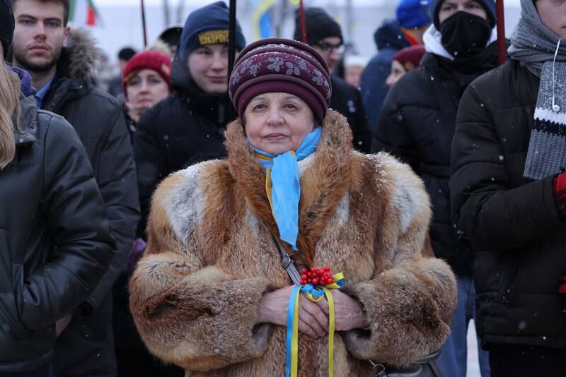 A woman attends the patriotic rally in Kiev. There are now more than 120,000 Russian troops posted on the border along with significant numbers of tanks, artillery and missile batteries. Getty Images