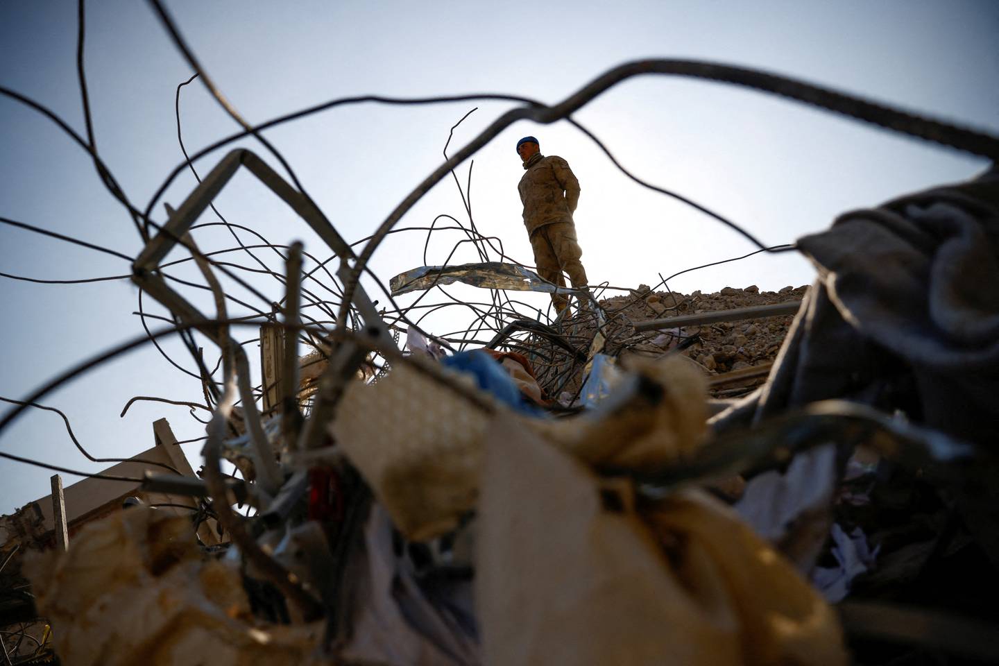 A member of the army stands amid rubble, in the aftermath of the deadly earthquake in Kahramanmaras, Turkey, on February 12. Reuters