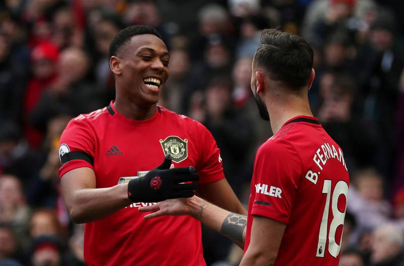 Manchester United's Anthony Martial celebrates scoring with Bruno Fernandes. Reuters