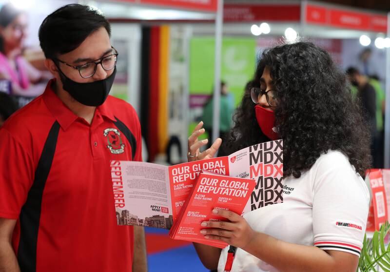 Visitors at the Middlesex University stand at the Global Education and Training Exhibition at Dubai World Trade Centre. All photos: Chris Whiteoak / The National