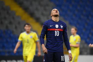 France's forward Kylian Mbappe reacts after missing a penalty kick during the FIFA World Cup Qatar 2022 qualification Group D football match between Kazakhstan and France, at the Astana Arena, in Nur-Sultan, on March 28, 2021. / AFP / FRANCK FIFE