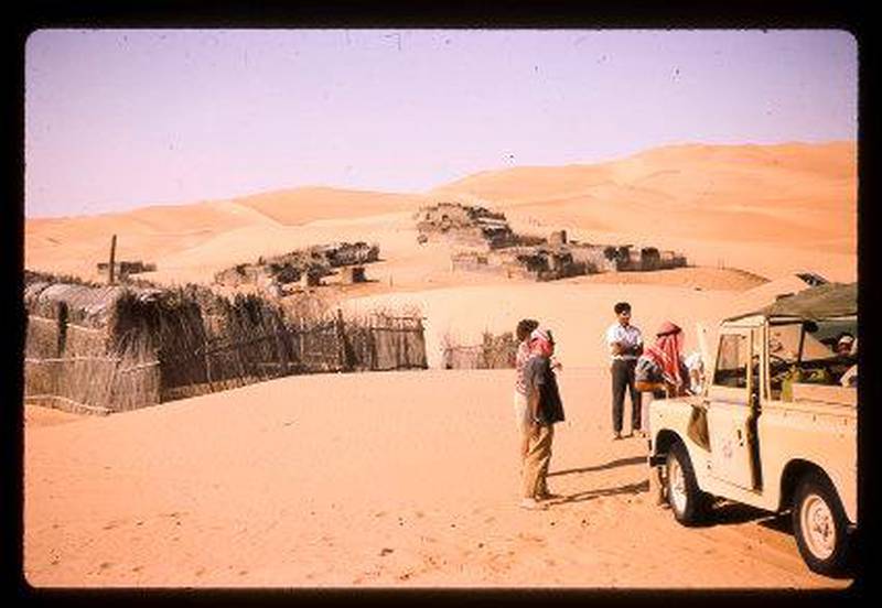 Palm frond huts in Liwa in 1967 with a Trucial Oman Scouts landrover in the foreground. Courtesy Nick Cochrane-Dyet