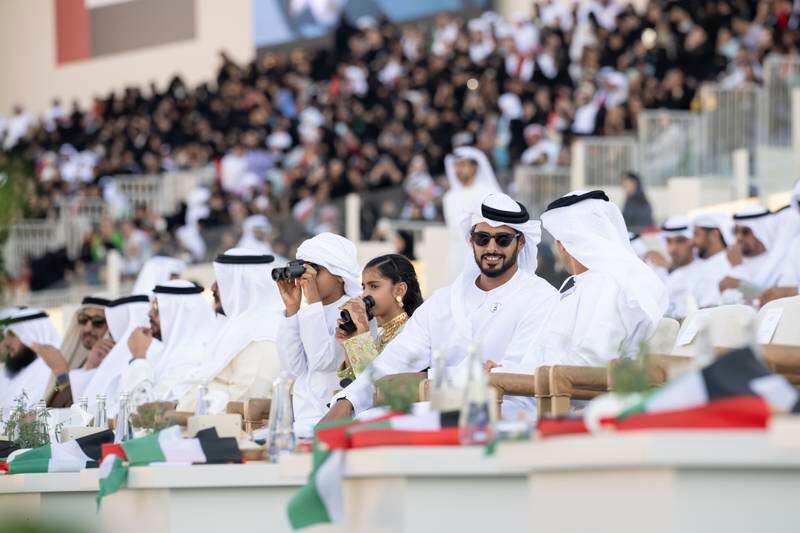 Sheikh Khaled bin Zayed, Chairman of the Board of Zayed Higher Organisation for Humanitarian Care and Special Needs; Sheikh Zayed bin Hamdan; Sheikha Shamma bint Khaled; and Sheikh Mohamed bin Khaled attend the Union Parade during the Sheikh Zayed Heritage Festival. Hamad Al Kaabi /  Presidential Court 