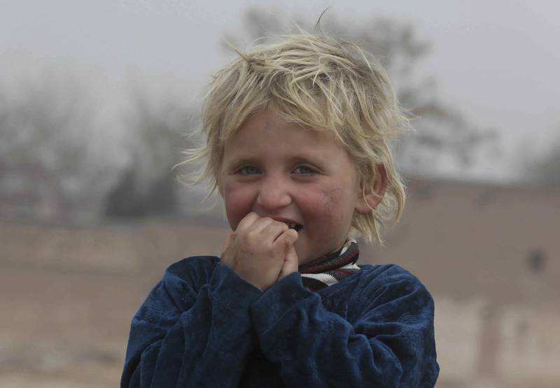 An Afghan refugee girl at the Kabobayan refugee camp. AP Photo