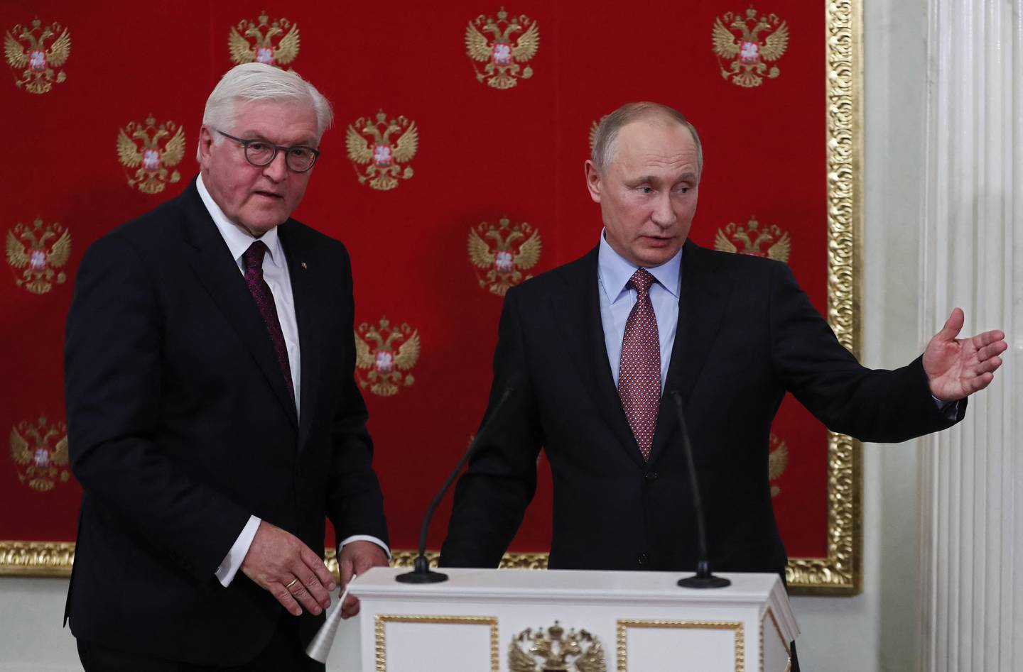 Germany's President Frank-Walter Steinmeier, left, said he misjudged Russian leader Vladimir Putin. AFP 