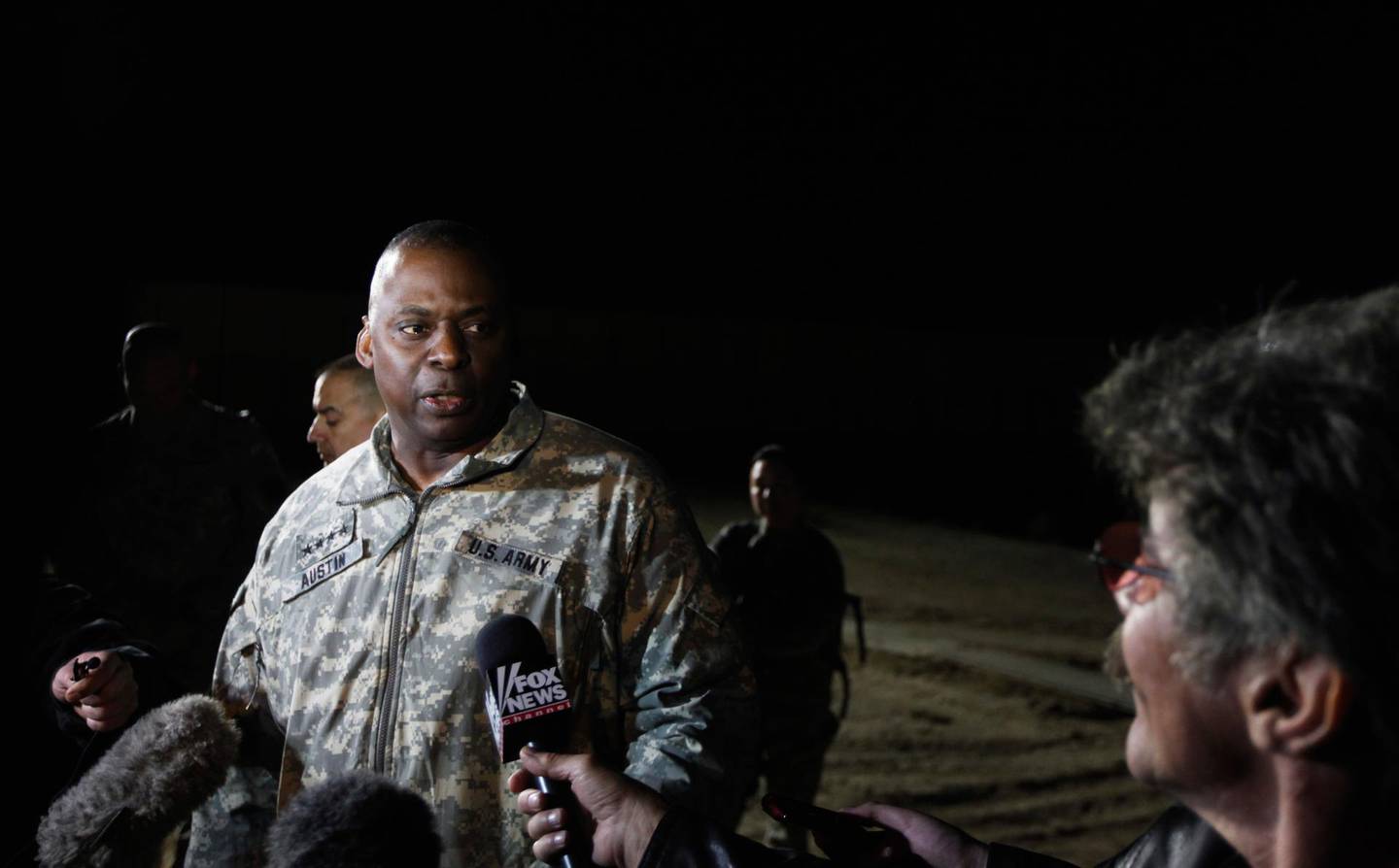 FILE: According to reports, retired four-star Army Gen. Lloyd Austin, is expected to be picked by President-elect Joe Biden to lead the Defense Department. If confirmed by Congress, Austin would be the first Black defense secretary to lead the Pentagon. Austin retired as the commander of U.S. Central Command in the Middle East in 2016, after 41 years in the U.S. Army. NASIRIYAH, IRAQ - DECEMBER 17:  U.S. Army General Lloyd Austin, Commander of U.S. forces in Iraq, speaks with Geraldo (R) following a casing of the colors ceremony at Camp Adder on December 17, 2011 near Nasiriyah, Iraq. All U.S. troops were scheduled to have departed Iraq by December 31st, 2011. At least 4,485 U.S. military personnel died in service in Iraq. According to the Iraq Body Count, more than 100,000 Iraqi civilians have died from war-related violence. (Photo by Lucas Jackson-Pool/Getty Images)