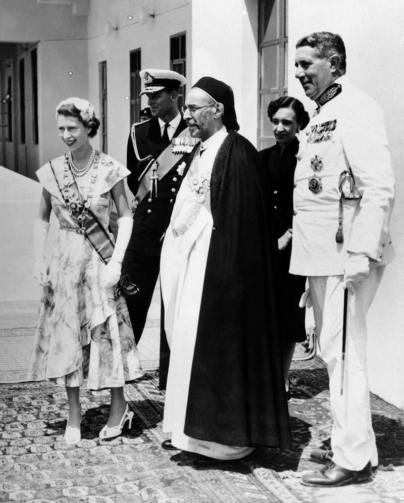 The queen and Prince Philip with King Idris of Libya at the Royal Palace in Tobruk in May 1954. AP