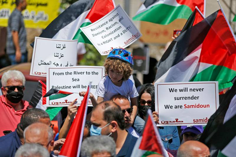 Palestinians demonstrate in the city of Ramallah, in the occupied West Bank. AFP