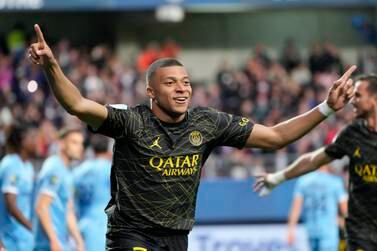 FILE - PSG's Kylian Mbappe celebrates after scoring his side's opening goal during the French League One soccer match between Troyes and Paris Saint Germain, at the Stade de l'Aube, in Troyes, France, Sunday, May 7, 2023.  Saudi Arabian soccer team Al-Hilal has made a record $332 million bid for France striker Kylian Mbappe.  Paris Saint-Germain has confirmed the offer and says it has given Al-Hilal permission to open negotiations directly with Mbappe.  (AP Photo / Lewis Joly, File)