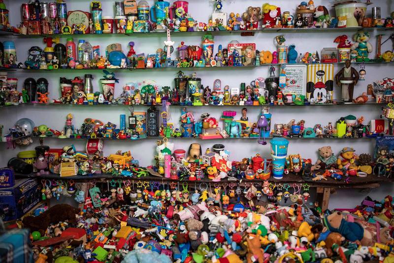 Shelves filled with toys are pictured in the home of Percival Lugue. Reuters