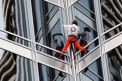 Dubai , United Arab Emirates- March, 28,  2011:  French 'Spiderman' Alain Robert  climbs the world's Tallest building  Burj Khalifa in Dubai . ( Satish Kumar / The National ) 