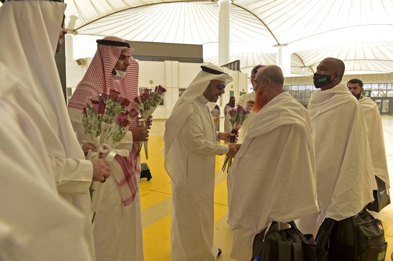 Hajj employees welcome pilgrims at King Abdulaziz International Airport in Jeddah. AFP
