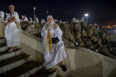 A Muslim woman prays. AP Photo