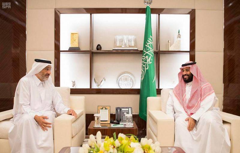 Jeddah, Dhu-AlQa dah 25, 1438, August 17, 2017, SPA -- In this image released by the Saudi Press Agency, Vice Custodian of the Two Holy Mosques Prince Mohammed bin Salman bin Abdulaziz Al Saud meets at the Peace Palace in Jiddah, Saudi Arabia Sheikh Abdullah bin Ali bin Abdullah bin Jassem Al Thani. Saudi Arabia said Thursday it is reopening its border with Qatar to allow Qataris to attend the hajj amid a monthslong rift between the neighboring countries that led to both sides trading accusations of politicizing the ritual. (Saudi Press Agency via AP)