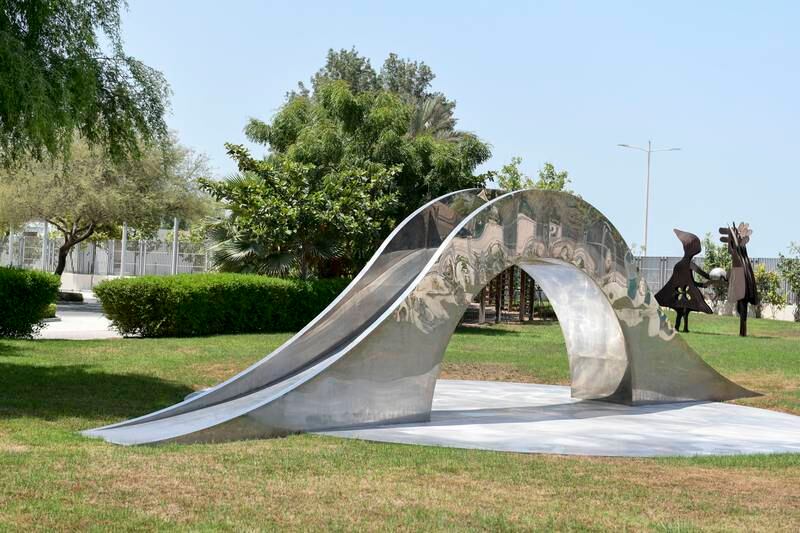 'Affinity', a mirrored bridge by Mehmet Ali Uysal at the Special Olympics Gardens. Khushnum Bhandari / The National