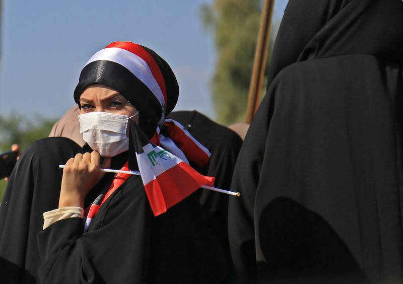 Iraqis take part in anti-government protests in Karbala. AFP