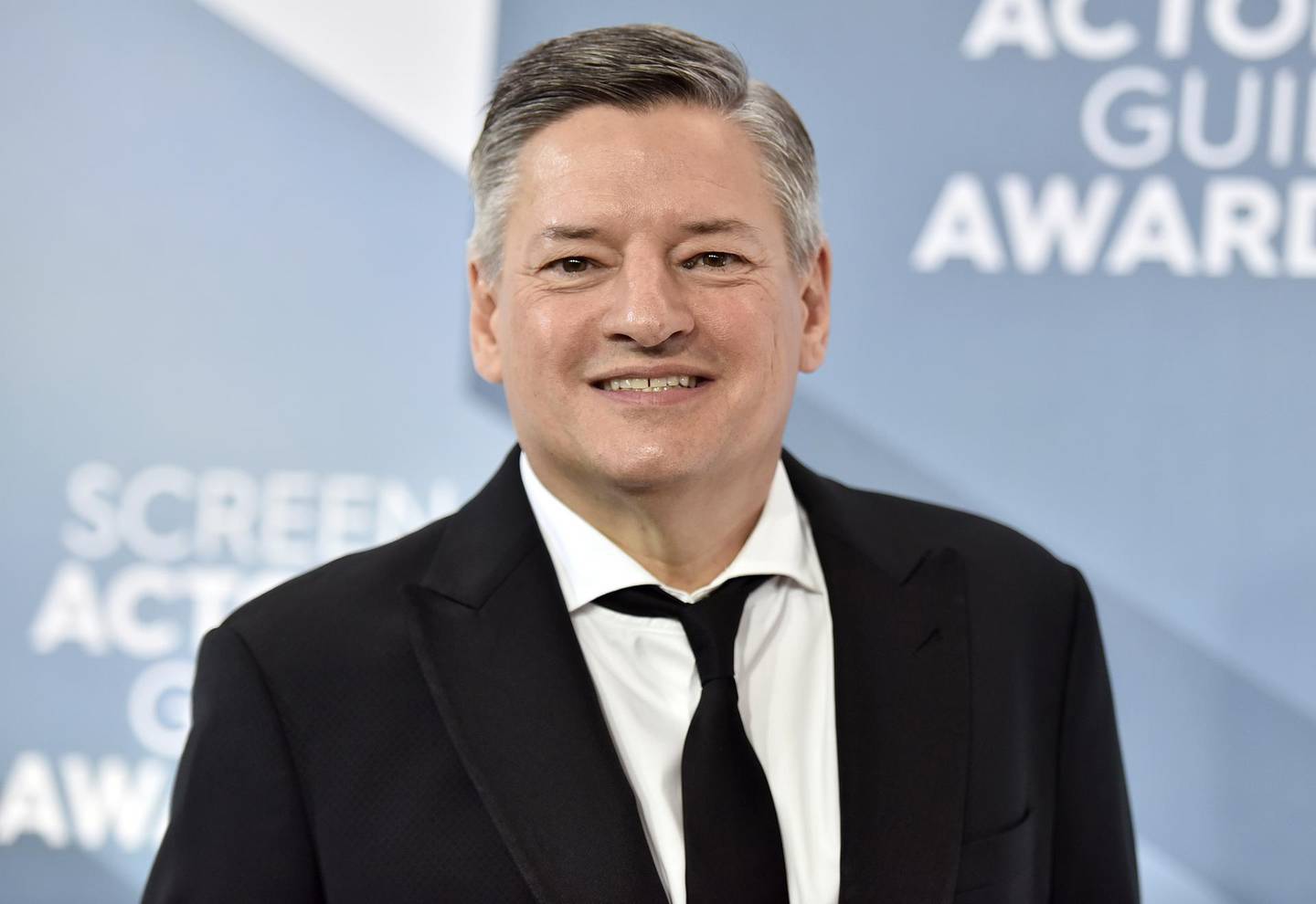 Ted Sarandos, Netflix's chief content officer, arrives at the 26th annual Screen Actors Guild Awards at the Shrine Auditorium & Expo Hall on Sunday, Jan. 19, 2020, in Los Angeles. (Photo by Richard Shotwell/Invision/AP)