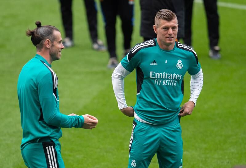 Real Madrid players Gareth Bale, left, and Toni Kroos attend their team's training session in Manchester. EPA 